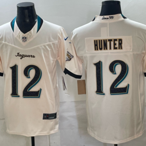 Jacksonville Jaguars 12 Travis Hunter Cream 2026 Rivalries F.U.S.E. Vapor Limited Men Jersey